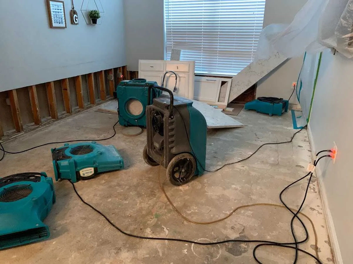 Dehumidifier in flood-cut room for Water Damage Restoration in Gateway